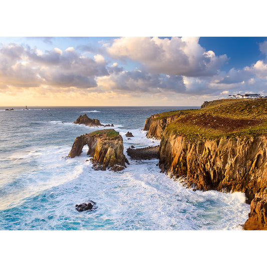 Rugged coastal cliffs on the Isle of Wight under a sunset sky with waves crashing against the shore photographed by Available Light Photography's Land's End.