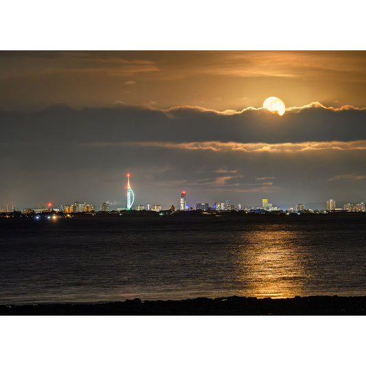 Full Moonrise over The Spinnaker Tower skyline at night on the Isle of Wight by Available Light Photography.