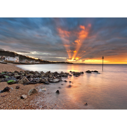 Sunset at a rocky isle with vibrant clouds and calm water captured by Available Light Photography's Gurnard.