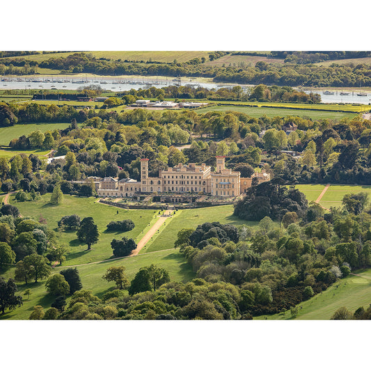 Aerial view of Osborne House, a grand historic estate amid lush greenery with a river in the background on the Isle of Wight, captured by Available Light Photography.