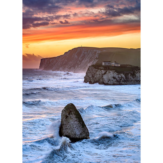 Sunset at Freshwater Bay, a rugged coastline with cliffs and rough sea waves on the Isle of Wight by Available Light Photography.