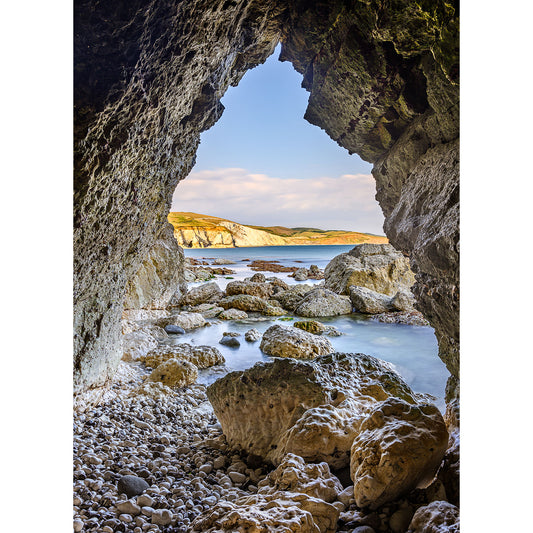 In the caves at Freshwater Bay with rocks and water on the Isle of Wight by Available Light Photography.