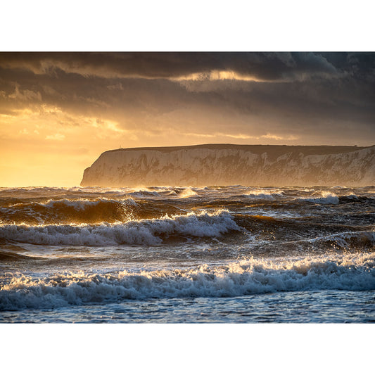 Compton Bay crashing at sunset with a cliff in the background on the Isle of Wight by Available Light Photography.