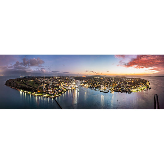 Panoramic aerial view of Cowes and East Cowes, a coastal town on the Isle of Wight, during sunrise and sunset transitions captured by Available Light Photography.