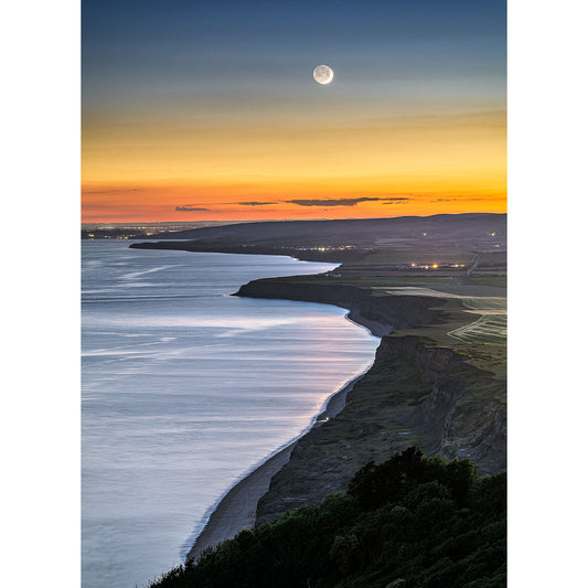 Crescent Moon over West Wight rising over a coastal landscape at twilight on the Isle of Wight, captured by Available Light Photography.