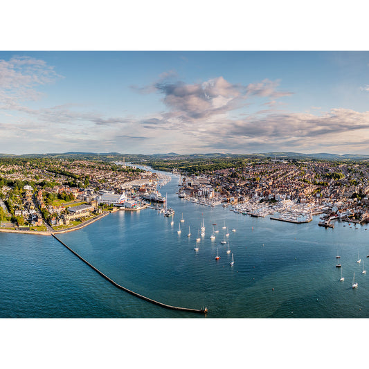 Aerial view of Cowes and East Cowes with a marina full of boats and a dividing breakwater on the Isle Gascoigne by Available Light Photography.