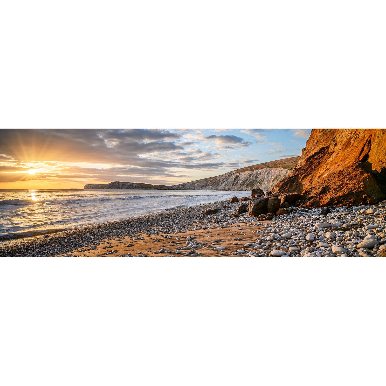 Sunset at Compton Bay, a pebble beach on the Isle of Wight with cliffs on the coastline, captured by Available Light Photography.