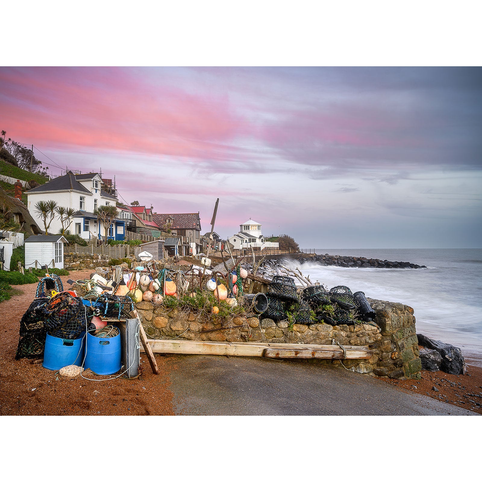 Image number 2807: Steephill Cove at sunset with fishing equipment and colorful sky, captured by Available Light Photography.