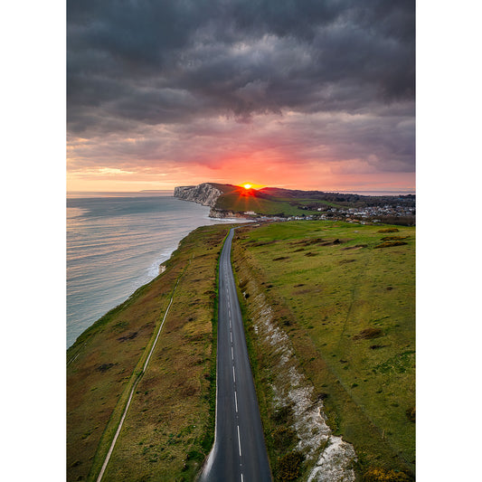 Sunset over The Military Road, Freshwater with dramatic clouds and a cliff in the distance. The image number is 2831. - Available Light Photography