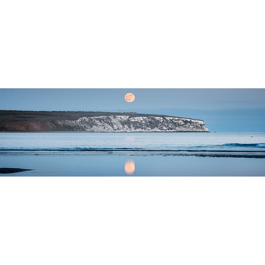 Moonrise, Culver Cliff by Available Light Photography captures a full moon over a white chalk cliff and calm sea, with the water reflecting the lunar glow beneath a brilliant blue sky.