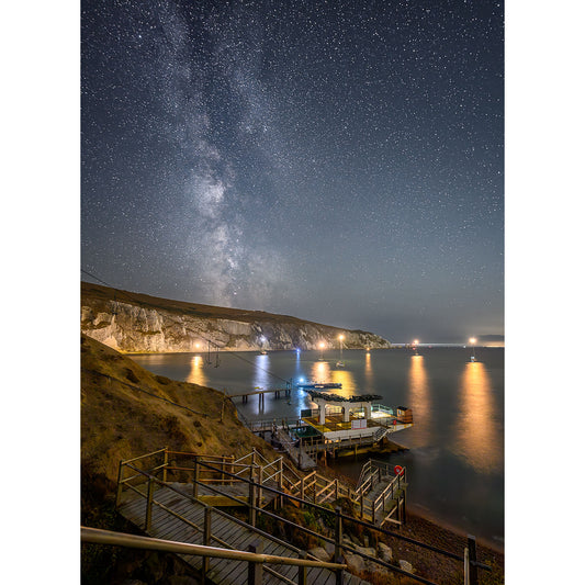 Milky Way, The Needles by Available Light Photography: A wooden staircase descends a cliff to docks and small buildings by calm water, under a star-filled night sky with the Milky Way shining above.