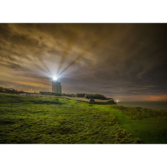 Image number 3102 by Available Light Photography showcases St. Catherine's Lighthouse with its beacon shining brightly from the top.