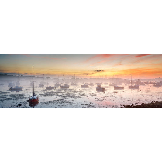 Boats at low tide during a misty sunrise. (Bembridge Harbour by Available Light Photography)