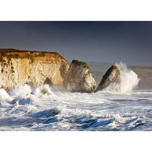 Freshwater Bay crashing against rugged cliffs on a sunny day on the Isle of Wight, captured by Available Light Photography.