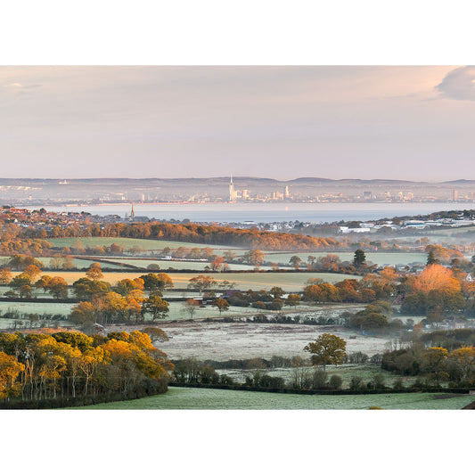 Early morning view over a frost-covered landscape with a distant industrial skyline painted by Steve using the View from Ashey Down by Available Light Photography.