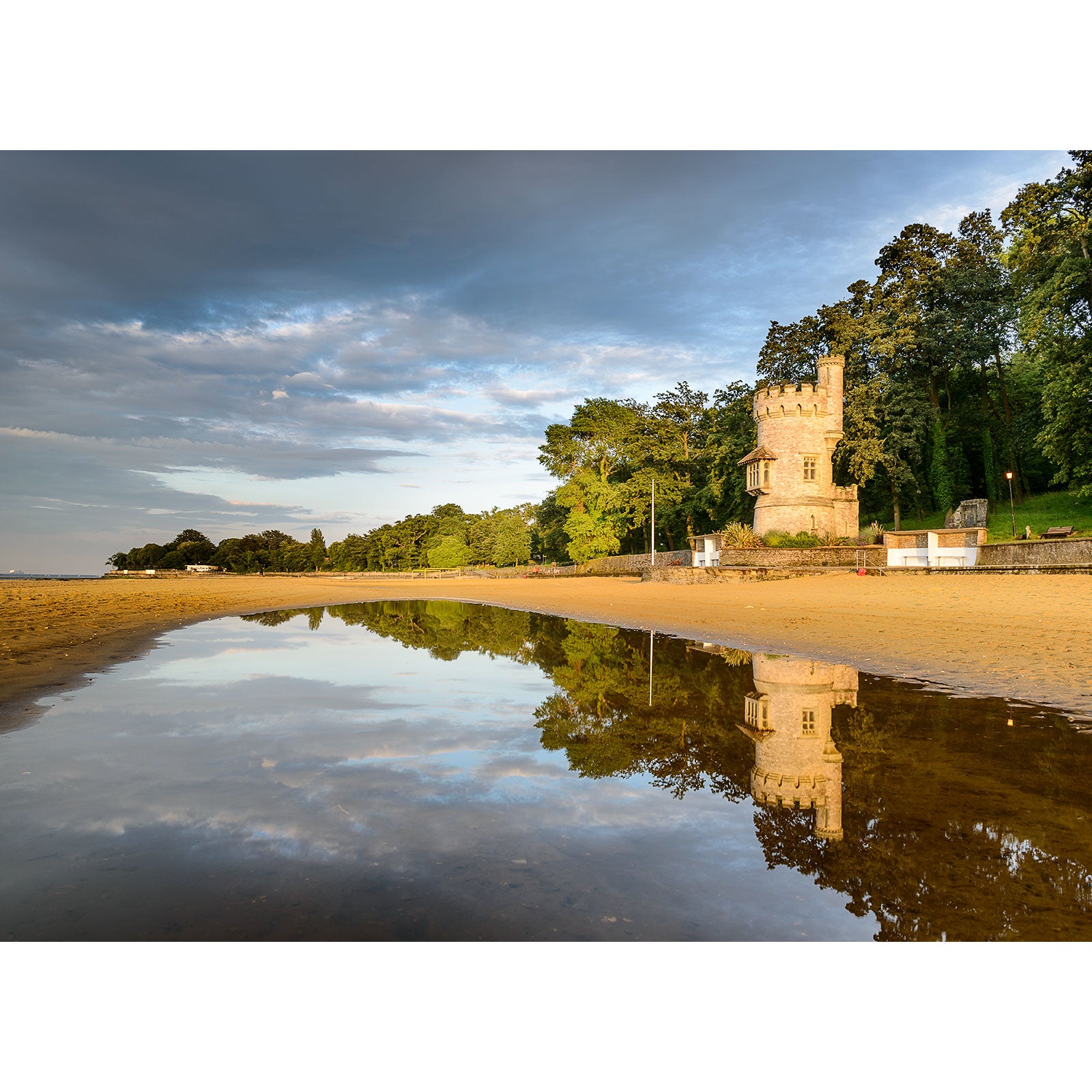 Appley Tower reflected in water on Isle of Wight beach at low tide under a clear sky, captured by Available Light Photography.