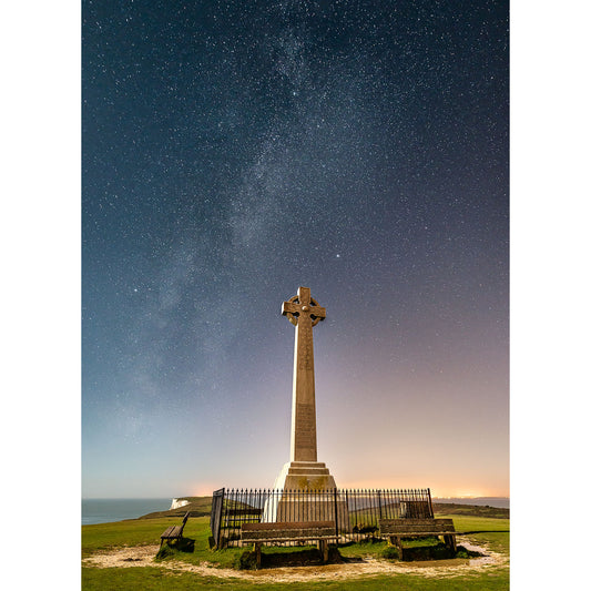 A Milky Way photograph of the Tennyson Monument war memorial on the Isle of Wight under a starry night sky by Available Light Photography.