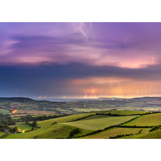 A vivid Lightning over West Wight storm over a rural landscape at dusk on the Isle of Wight, captured by Available Light Photography.