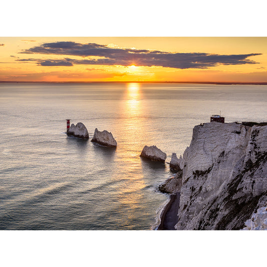 Sunset over Threading The Needles chalk cliffs with sea stacks and a calm ocean by Available Light Photography.