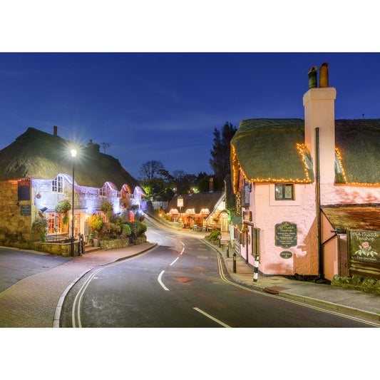 Twilight over a quaint village street on the Isle of Wight, lined with Shanklin Old Village cottages and illuminated by Available Light Photography.