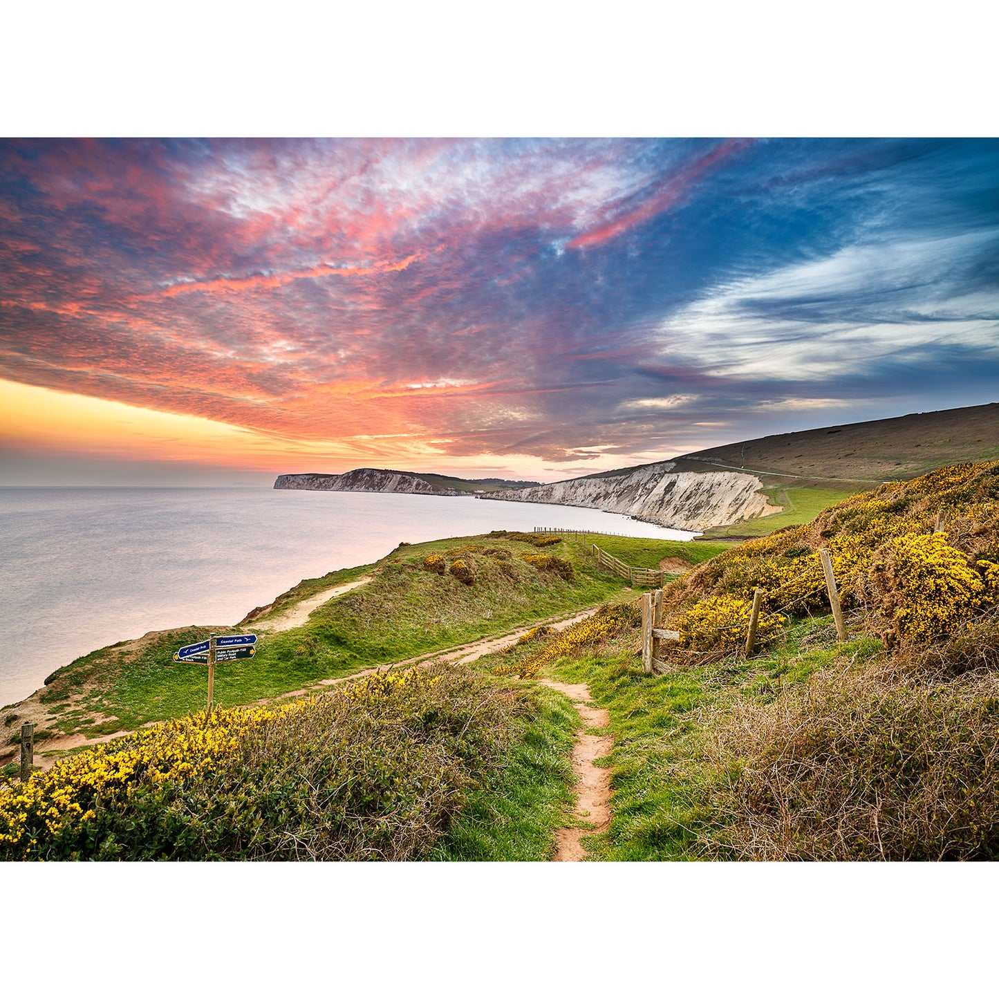 Coastal path on the Isle of Wight leading towards Compton Bay under a vibrant sunset sky. (Available Light Photography)