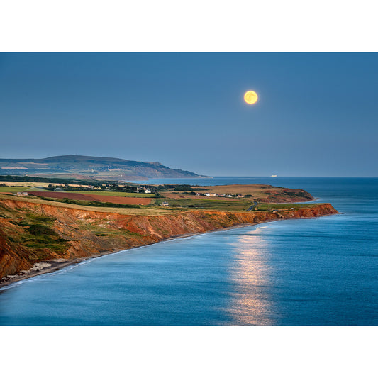 Full Moonrise over Compton Bay rising over a coastal landscape at dusk on the Isle of Wight by Available Light Photography.