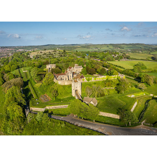 Aerial view of Carisbrooke Castle on the Isle of Wight with surrounding green landscape on a clear day, captured by Available Light Photography.